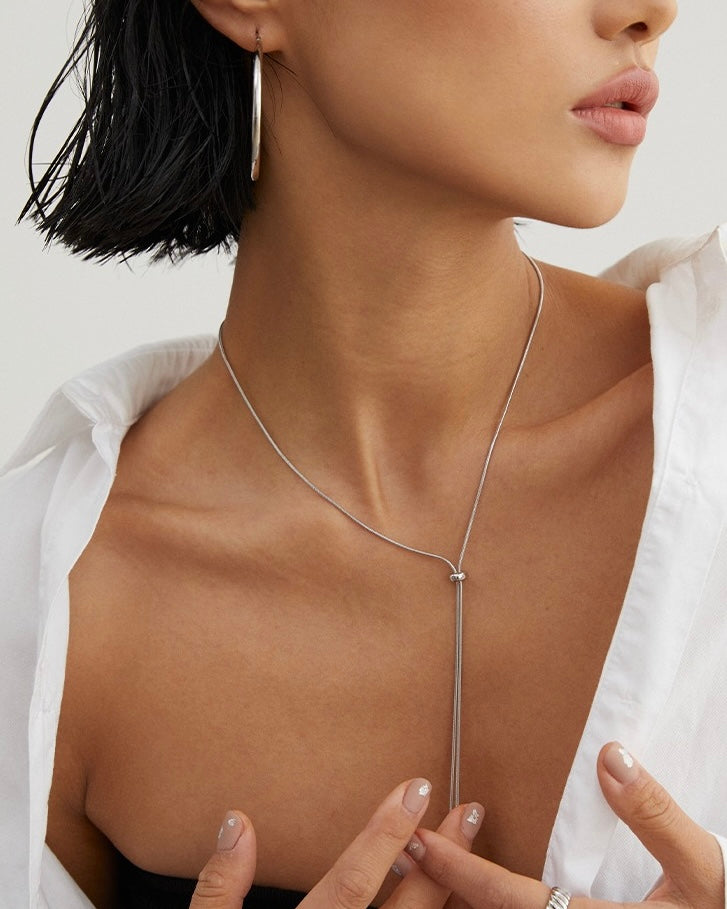 Elegance Unveiled Long Silver Necklace